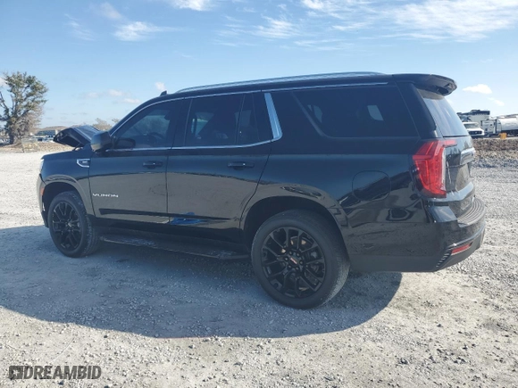 2022 GMC Yukon SLE with VIN 1GKS1AKD3NR327219, listed as a Copart auction lot 43045495 with 52,215 mi miles and Salvage Title. Bid and sale history available at carsss.com. Image 2.