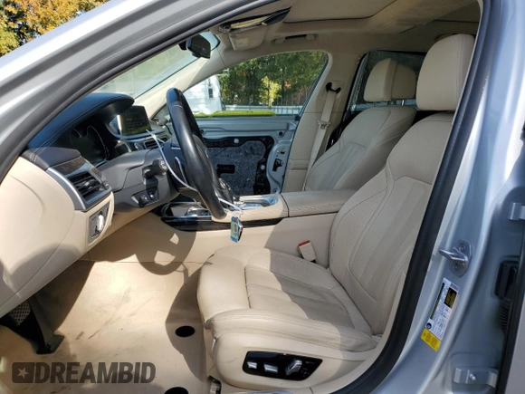 2018 BMW 7 Series 750i with VIN WBA7F0C53JGM22810, listed as a Copart auction lot 72796303 with 63,047 mi miles. Bid and sale history available at carsss.com. Image 7.