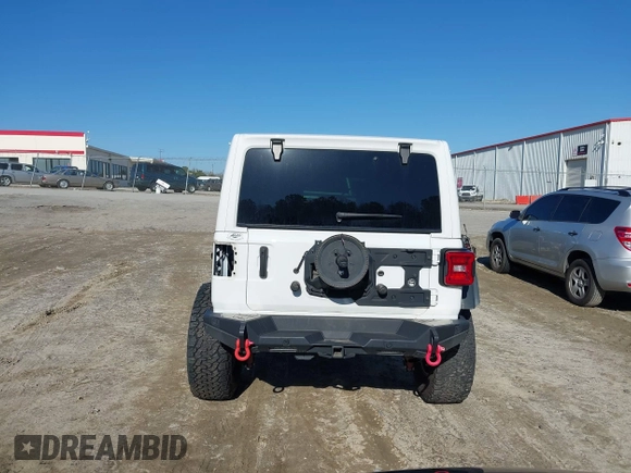2022 Jeep Wrangler Unlimited Rubicon z VIN 1C4JJXFGXNW121489, wystawiony jako IAAI lot #41749550 z przebiegiem 56 601 mil mil oraz . Historia ofert i sprzedaży dostępna na DreamBid. Obrazek 17.