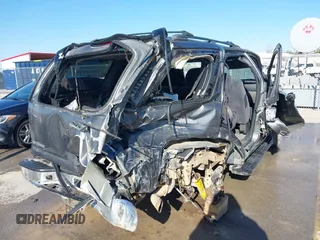 2002 Chevrolet Tahoe LT z VIN 1GNEC13Z42R319646, wystawiony jako IAAI lot #41623259 z przebiegiem 250 430 mil mil oraz . Historia ofert i sprzedaży dostępna na DreamBid. Obrazek 4.