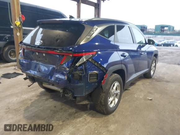 2022 Hyundai Tucson SEL with VIN 5NMJBCAEXNH069845, listed as a IAAI auction lot 41481383 with 10,985 mi miles and . Bid and sale history available at DreamBid. Image 4.