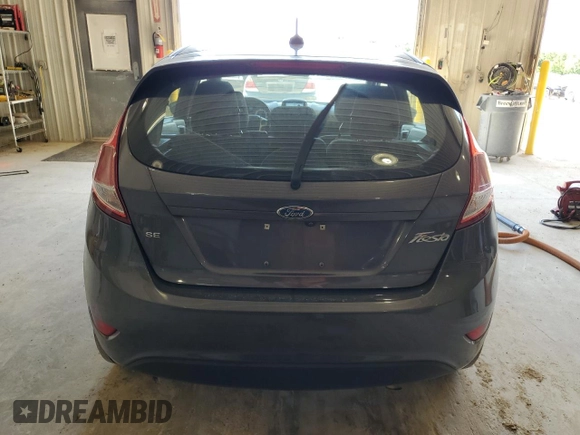 2019 Ford Fiesta SE z VIN 3FADP4EJ9KM159868, wystawiony jako Copart lot #58353995 z przebiegiem 87 940 mil mil oraz Szkoda całkowita • Salvage title. Historia ofert i sprzedaży dostępna na DreamBid. Obrazek 6.