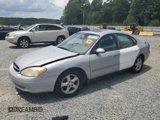 2000 Ford Taurus SES with VIN 1FAFP55S9YA157759, listed as a Copart auction lot 56511415 with 92,639 mi miles and Salvage title. Bid and sale history available at DreamBid. Image 1.