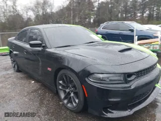 2021 Dodge Charger Scat Pack with VIN 2C3CDXGJ2MH659275, listed as a IAAI auction lot 41284815 with 51383 miles. Bid and sale history available at carsss.com. Image 1.