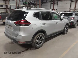 2020 Nissan Rogue SL with VIN 5N1AT2MV0LC795806, listed as a IAAI auction lot 41660180 with 64,217 mi miles and . Bid and sale history available at DreamBid. Image 4.