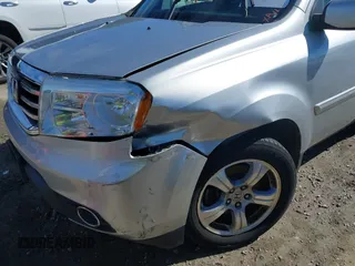2014 Honda Pilot EX-L with VIN 5FNYF3H79EB008515, listed as a IAAI auction lot 41687048 with 195,830 mi miles and . Bid and sale history available at carsss.com. Image 6.