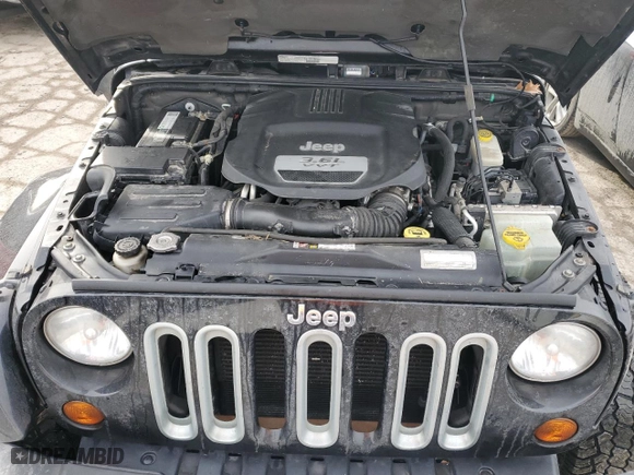 2013 Jeep Wrangler Unlimited Sahara with VIN 1C4BJWEG2DL525547, listed as a Copart auction lot 43263205 with 116,979 mi miles and Salvage Title. Bid and sale history available at carsss.com. Image 13.