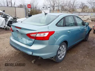 2012 Ford Focus SE with VIN 1FAHP3F24CL336350, listed as a IAAI auction lot 41882948 with 153,238 mi miles. Bid and sale history available at carsss.com. Image 4.