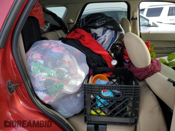 2008 Ford Escape XLT with VIN 1FMCU03198KB05556, listed as a Copart auction lot 42531975 with 105,277 mi miles and Salvage title. Bid and sale history available at DreamBid. Image 11.