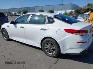 2019 Kia Optima LX with VIN 5XXGT4L33KG324175, listed as a IAAI auction lot 42139795 with 105,273 mi miles. Bid and sale history available at carsss.com. Image 3.