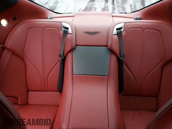 2015 Aston Martin DB9 z VIN SCFFDAEM9FGA16279, wystawiony jako Copart lot #81886554 z przebiegiem 25 029 mil mil oraz Szkoda całkowita • Salvage title. Historia ofert i sprzedaży dostępna na DreamBid. Obrazek 10.