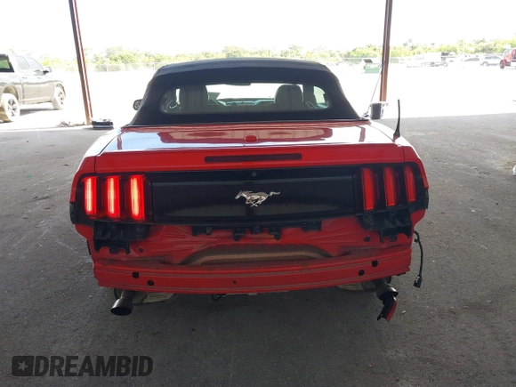 2016 Ford Mustang EcoBoost Premium z VIN 1FATP8UH5G5247265, wystawiony jako IAAI lot #42502161 z przebiegiem 116 460 mil mil oraz . Historia ofert i sprzedaży dostępna na DreamBid. Obrazek 17.