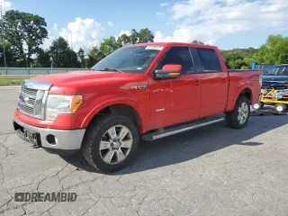 2012 Ford F-150 XL with VIN 1FTFW1ET3CFC88812, listed as a Copart auction lot 61008525 with 184,569 mi miles and Salvage title. Bid and sale history available at DreamBid. Image 1.