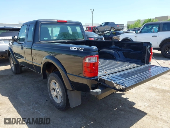 2005 Ford Ranger XL with VIN 1FTYR14U25PA85501, listed as a IAAI auction lot 42064428 with 114,906 mi miles. Bid and sale history available at carsss.com. Image 3.