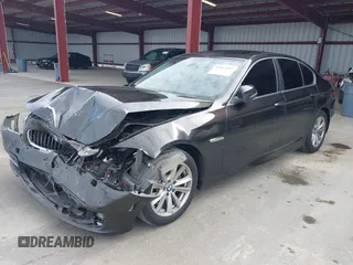 2014 BMW 5 Series 528i with VIN WBA5A5C52ED503033, listed as a IAAI auction lot 41562997 with 127,564 mi miles. Bid and sale history available at carsss.com. Image 2.