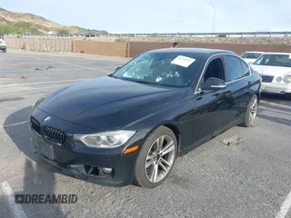 2015 BMW 3 Series 328i with VIN WBA3A5C55FP604316, listed as a IAAI auction lot 41915627 with 120,594 mi miles. Bid and sale history available at carsss.com. Image 2.