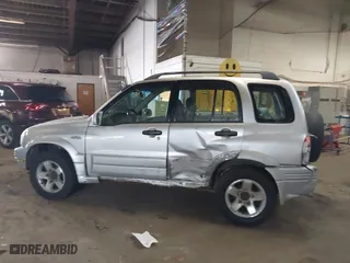 2000 Suzuki Grand Vitara JLX with VIN JS3TD62V1Y4101244, listed as a IAAI auction lot 41635060 with 169,951 mi miles. Bid and sale history available at carsss.com. Image 14.