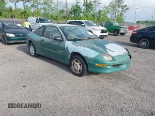 1999 Pontiac Sunfire SE z VIN 1G2JB1246X7536249, wystawiony jako IAAI lot #41982996 z przebiegiem 128 467 mil mil oraz . Historia ofert i sprzedaży dostępna na DreamBid. Obrazek 1.