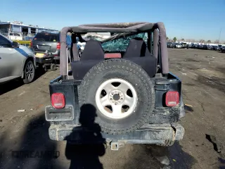 2000 Jeep Wrangler SE with VIN 1J4FA29P8YP727063, listed as a Copart auction lot 89113555 with 91,032 mi miles and Salvage Title. Bid and sale history available at carsss.com. Image 6.