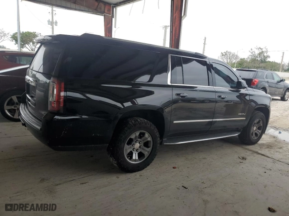 2020 GMC Yukon XL Denali with VIN 1GKS1HKJ6LR127236, listed as a Copart auction lot 51928885 with 143,579 mi miles and Salvage Title. Bid and sale history available at carsss.com. Image 3.