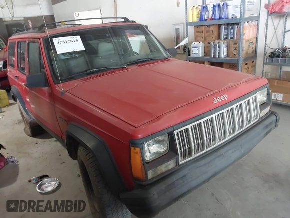 1996 Jeep Cherokee Sport with VIN 1J4FJ68S0TL177046, listed as a IAAI auction lot 42412615 with 176,657 mi miles and . Bid and sale history available at DreamBid. Image 1.
