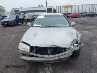 2004 Nissan Sentra S z VIN 3N1CB51D04L479005, wystawiony jako IAAI lot #42278120 z przebiegiem 157 829 mil mil oraz . Historia ofert i sprzedaży dostępna na DreamBid. Obrazek 13.