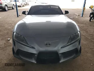 2021 Toyota GR Supra 3.0 with VIN WZ1DB0C09MW036216, listed as a Copart auction lot 86403444 with 14,800 mi miles and Salvage Title. Bid and sale history available at carsss.com. Image 5.