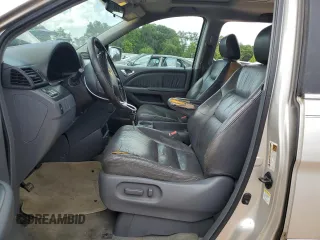 2006 Honda Odyssey EX-L z VIN 5FNRL387X6B458818, wystawiony jako Copart lot #61801335 z przebiegiem 227 179 mil mil oraz Czysty tytuł • Clean title. Historia ofert i sprzedaży dostępna na DreamBid. Obrazek 7.