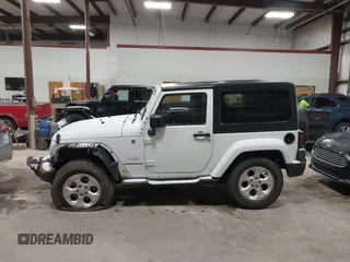 2014 Jeep Wrangler Sahara with VIN 1C4AJWBG7EL234625, listed as a IAAI auction lot 41726770 with 128,080 mi miles and . Bid and sale history available at DreamBid. Image 14.