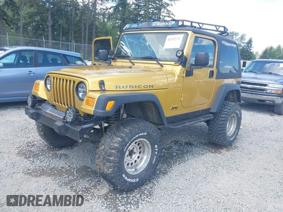 2003 Jeep Wrangler Rubicon with VIN 1J4FA69S93P302102, listed as a IAAI auction lot 42312951 with 146,408 mi miles and . Bid and sale history available at DreamBid. Image 18.