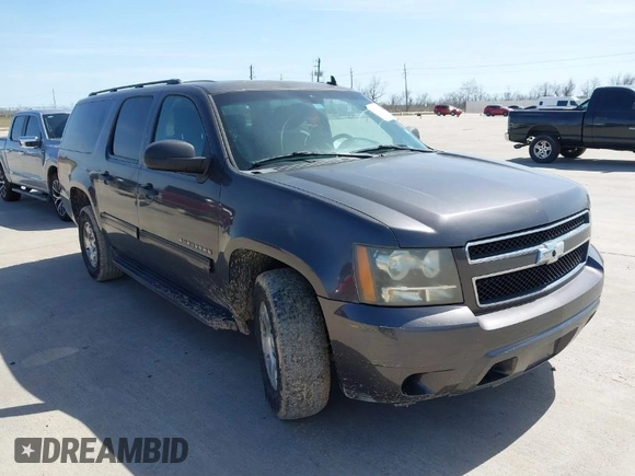 2010 Chevrolet Suburban LS z VIN 1GNUKHE36AR207087, wystawiony jako IAAI lot #41729820 z przebiegiem 266 177 mil mil oraz . Historia ofert i sprzedaży dostępna na DreamBid. Obrazek 1.