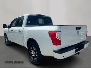 2020 Nissan Titan with VIN 1N6AA1ED8LN5011, listed as a Copart auction lot 67142895 with 132,686 mi miles and Clean title. Bid and sale history available at DreamBid. Image 3.