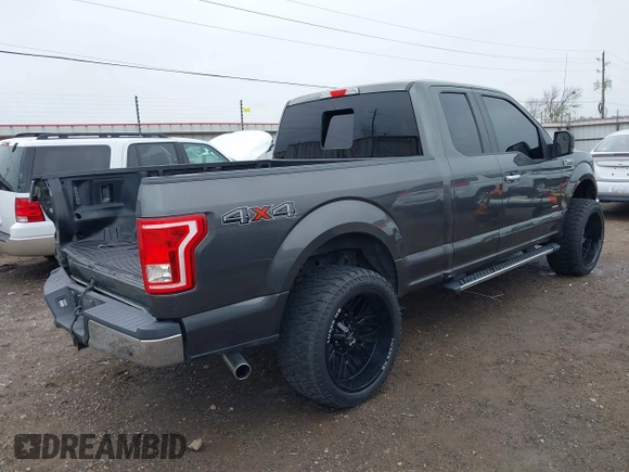 2015 Ford F-150 XLT with VIN 1FTEX1EP9FFC75210, listed as a IAAI auction lot 39041797 with 125,522 mi miles. Bid and sale history available at carsss.com. Image 4.