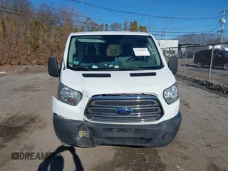 2015 Ford Transit Cargo with VIN 1FTNR1ZM6FKA65780, listed as a IAAI auction lot 41682836 with 144,338 mi miles and . Bid and sale history available at DreamBid. Image 12.
