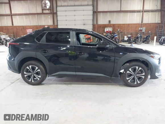 2024 Subaru Solterra Touring with VIN JTMABABA9RA052065, listed as a IAAI auction lot 42648692 with 13,880 mi miles and . Bid and sale history available at DreamBid. Image 14.