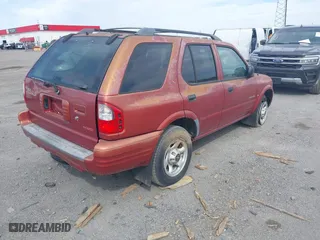 2001 Isuzu Rodeo S with VIN 4S2DM58W514315077, listed as a IAAI auction lot 41784050 with 149,737 mi miles. Bid and sale history available at carsss.com. Image 4.