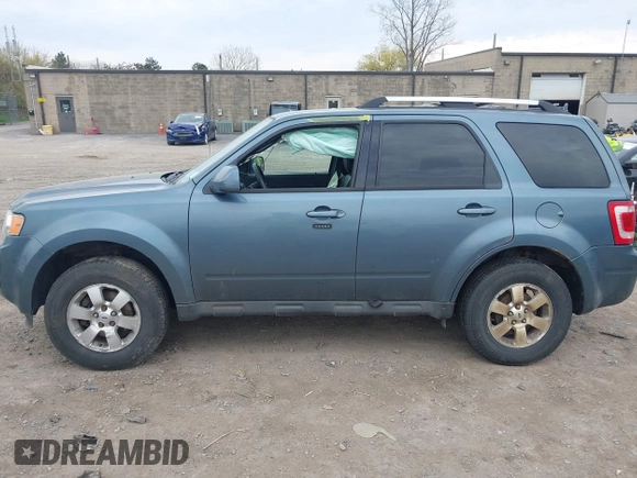 2011 Ford Escape Limited with VIN 1FMCU9EG2BKA75300, listed as a IAAI auction lot 42098247 with 215,102 mi miles. Bid and sale history available at carsss.com. Image 14.