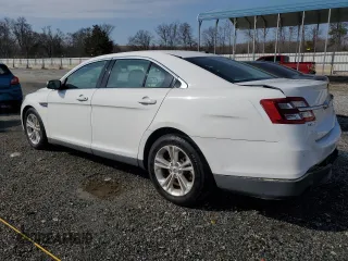 2016 Ford Taurus SEL with VIN 1FAHP2E96GG128073, listed as a Copart auction lot 44019985 with 104,090 mi miles and Salvage Title. Bid and sale history available at DreamBid. Image 2.