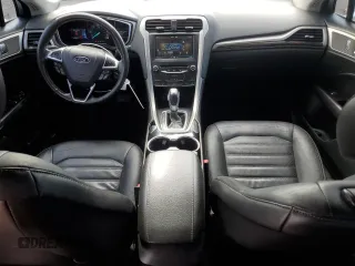 2014 Ford Fusion SE Hybrid with VIN 3FA6P0LU1ER308327, listed as a Copart auction lot 58127315 with 189,069 mi miles and Salvage title. Bid and sale history available at DreamBid. Image 8.