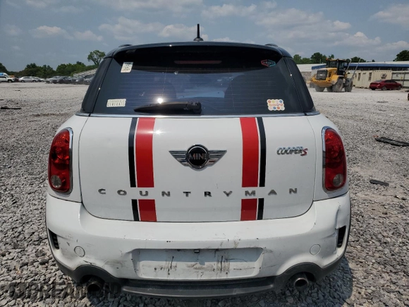 2015 MINI Countryman S with VIN WMWZC3C55FWT03267, listed as a Copart auction lot 59331605 with 116,964 mi miles and Salvage title. Bid and sale history available at DreamBid. Image 6.
