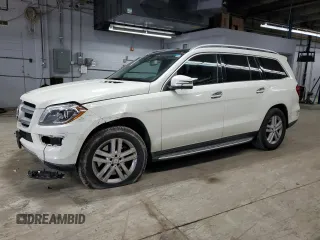 2013 Mercedes-Benz GL 450 z VIN 4JGDF7CE5DA254475, wystawiony jako Copart lot #51059665 z przebiegiem 119 656 mil mil oraz Szkody całkowita. Historia ofert i sprzedaży dostępna na DreamBid. Obrazek 1.