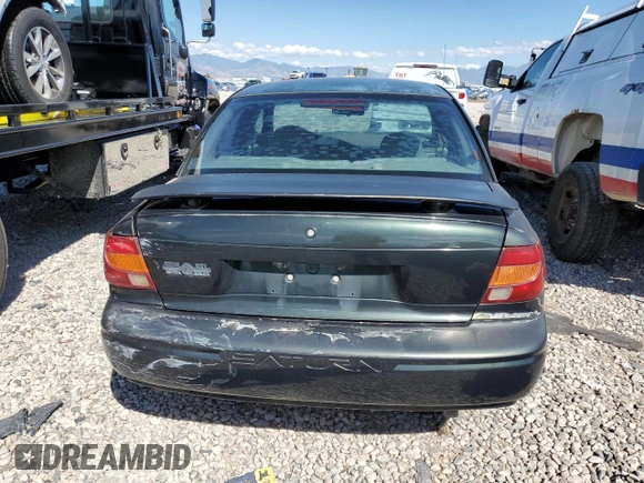 2000 Saturn SL with VIN 1G8ZH5285YZ240565, listed as a Copart auction lot 66567153 with 202,109 mi miles and Salvage title. Bid and sale history available at DreamBid. Image 6.