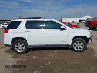 2015 GMC Terrain SLT z VIN 2GKALSEKXF6303261, wystawiony jako IAAI lot #41587386 z przebiegiem 132 260 mil mil oraz . Historia ofert i sprzedaży dostępna na DreamBid. Obrazek 14.