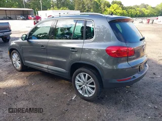 2013 Volkswagen Tiguan S with VIN WVGAV3AX7DW624136, listed as a IAAI auction lot 42256657 with 124,000 mi miles and . Bid and sale history available at DreamBid. Image 3.
