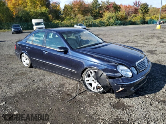 2003 Mercedes-Benz E-Class 5.0L with VIN WDBUF70J53A141452, listed as a Copart auction lot 75902244 with 0 mi miles and Salvage Title. Bid and sale history available at carsss.com. Image 4.