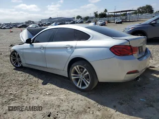 2018 BMW 4 Series 430i with VIN WBA4J1C55JBG75988, listed as a Copart auction lot 58623265 with 71,976 mi miles and Salvage title. Bid and sale history available at DreamBid. Image 2.