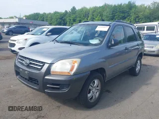 2006 Kia Sportage LX z VIN KNDJE723467218223, wystawiony jako IAAI lot #42520812 z przebiegiem 199 798 mil mil oraz . Historia ofert i sprzedaży dostępna na DreamBid. Obrazek 2.