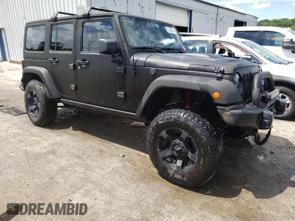 2013 Jeep Wrangler Unlimited Rubicon 10th Anniversary with VIN 1C4HJWFGXDL543660, listed as a Copart auction lot 61462104 with 115,897 mi miles and Salvage title. Bid and sale history available at DreamBid. Image 4.