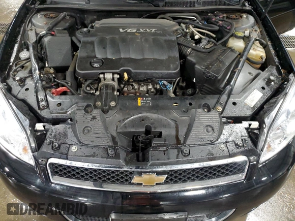 2014 Chevrolet Impala LT with VIN 2G1WB5E3XE1105184, listed as a Copart auction lot 82112844 with 289,783 mi miles and Salvage Title. Bid and sale history available at DreamBid. Image 12.