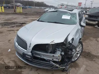 2013 Lincoln MKS EcoBoost with VIN 1LNHL9FT9DG611640, listed as a IAAI auction lot 41131303 with 135,550 mi miles and . Bid and sale history available at DreamBid. Image 6.